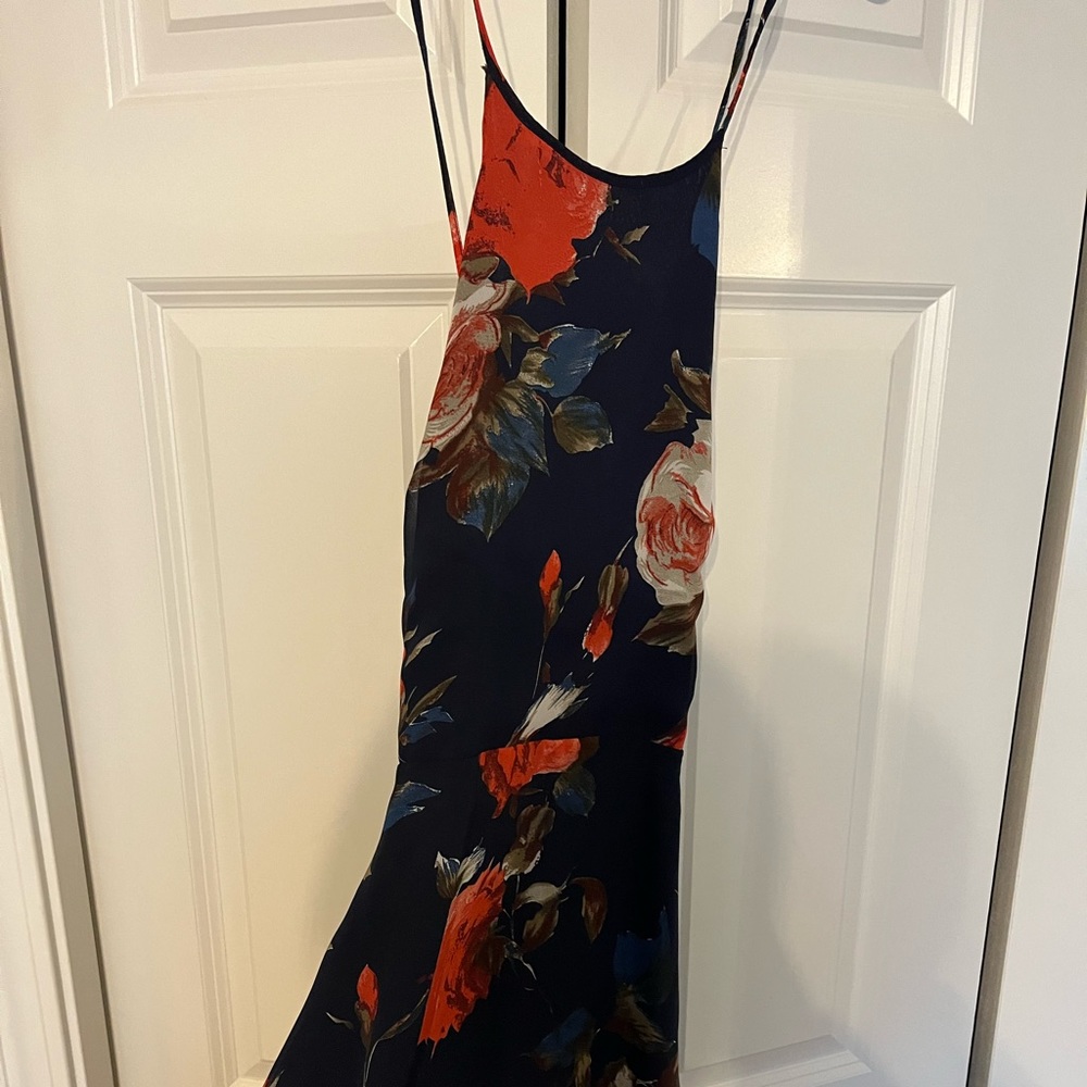 Lulu’s wedding guest dress with a tie back, floor length, blue with florals.